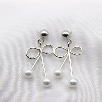 Bow Pearl Dangle Earrings